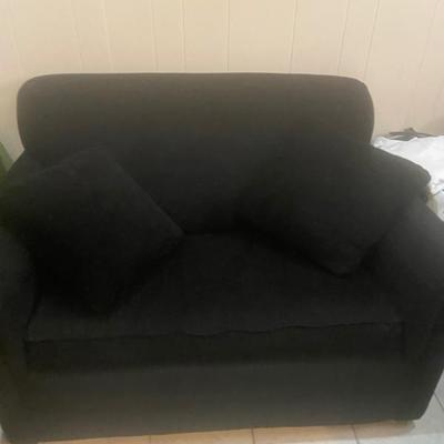 Chair and a half that folds out to a twin bed. Great condition.