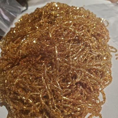 Gold colored seed beads