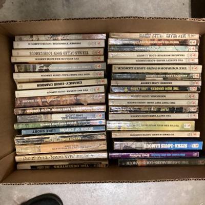 LOUIS L'AMOUR Paper back books. hold box for one price.