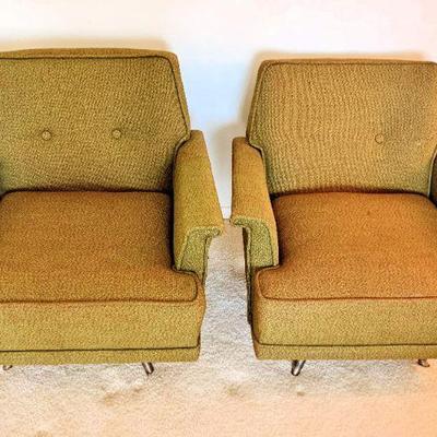 Mid Century Modern upholstered armchairs that rock