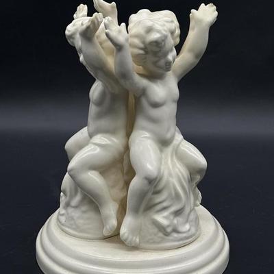 White Bisque Figurine w/ 3 Dancing Cupids