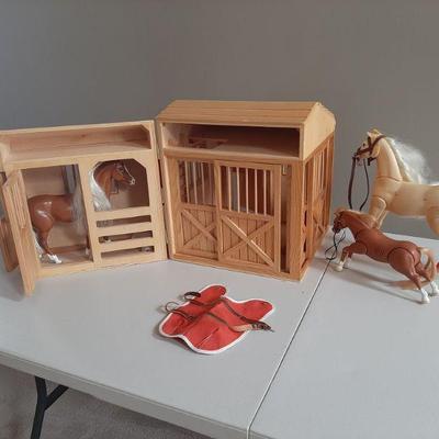 Melissa and Doug toy horse stable with 3 horses. $45.00