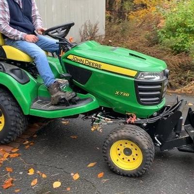 Like-new John Deere X 738, with attachments.  44 hrs.  