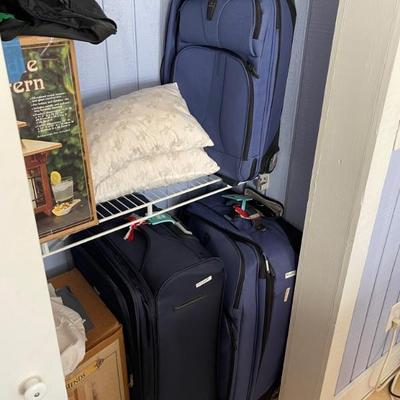 Suitcases (more on ground floor in garage)