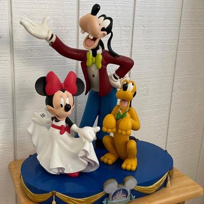 Disneyâ€™s 50th Happy Celebration Figures on Stand (we found the same size Mickey Mouse that goes with this, after the ad was published,...