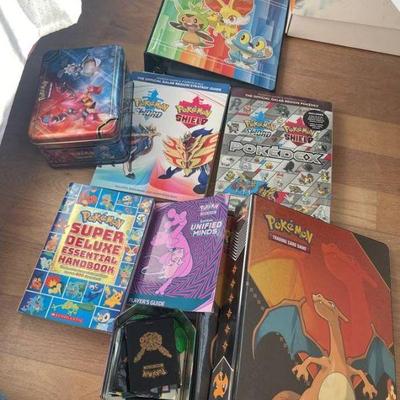 PokÃ©mon collection cards and guide books