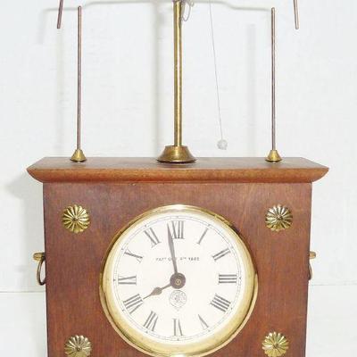 swinging pendulum clock