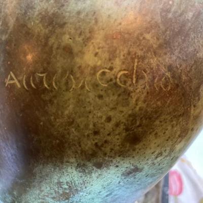 Signature on brass statue