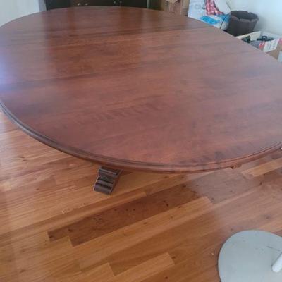 Very large, solid wood table, no chairs
