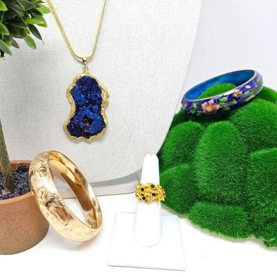 Lot of Four Pieces - Two Bangle Bracelets, Geode Pendant on Gold Chain and Gold Tone Ring w/ Blue Stones