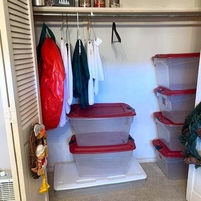 Storage tubs, table cloths, Christmas tins, wreath storage holders