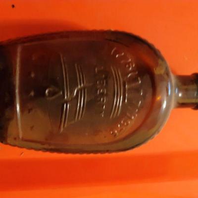 Vintage syrup bottle