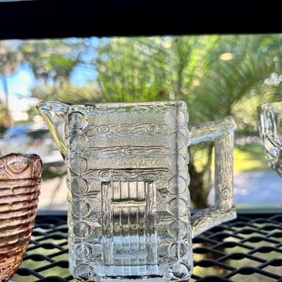 Antique glass log cabin pitcher