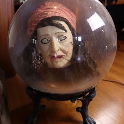 Spooky medium head in a clear ball