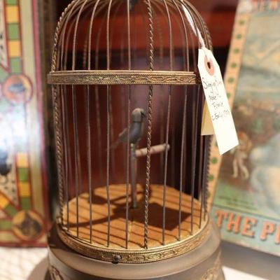 Antique singing bird in a cage, automaton