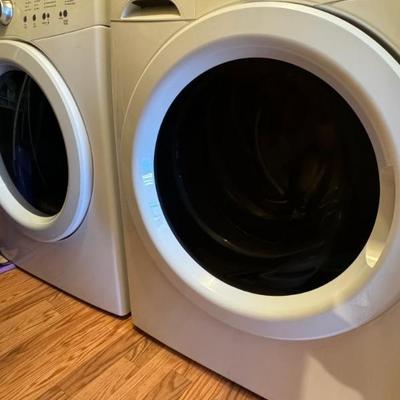 Working washer and dryer set.