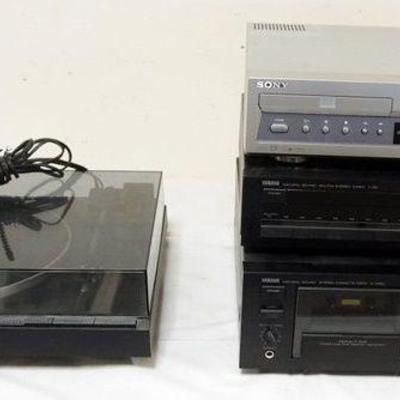 1111	YAMAHA AM/FM TUNER CASSETTE DECK, SONY DVD/VHS PLAYER AND YAMAHA RECORD PLAYER

