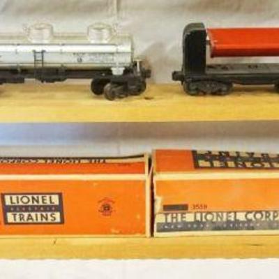 1043	LIONEL TRAIN LOT OF 4 CARS INCLUDING 6457, 6415, 3559, 6357
