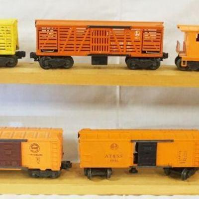 1036	LIONEL TRAIN LOT OF 6 CARS INCLUDING 63521, 63132, 6257, 6656, 3656, 611925
