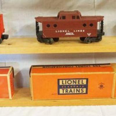 1047	LIONEL TRAIN LOT OF 3 CARS INCLUDING 6434, 6427, 61100
