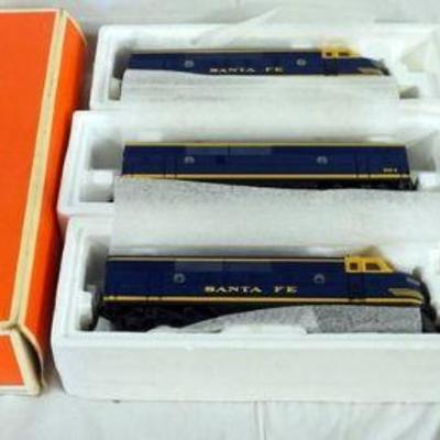 1128	LIONEL TRAIN SANTA-FE F-3 DIESELS O GAUGE
