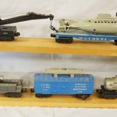 1039	LIONEL TRAIN CARS LOT OF 5 INCLUDING 6560, 3830, 6420, 3357, 6465
