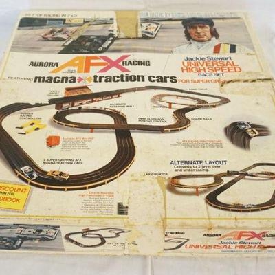 1146	HO GAUGE SLOT CAR AURORA AFX JACKIE STEWART SLOT CAR SET
