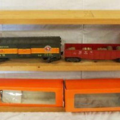 1056	LIONEL TRAIN LOT OF 4 CARS INCLUDING 6464, 6462, 36502 & 2004 CHRISTMAS CAR
