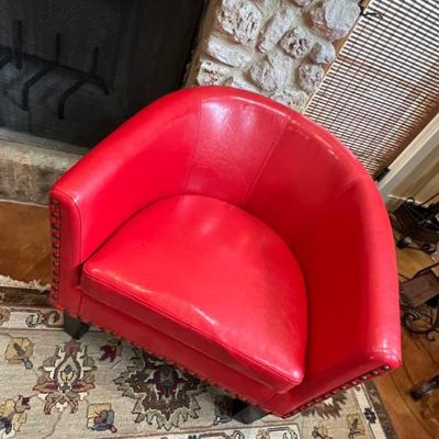 2 red leather chairs