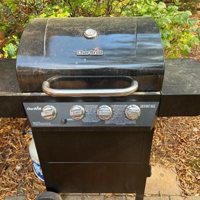 Charbroil Grill w/four burners and propane tank