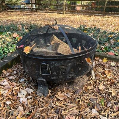 Metal Fire Pit wi/wood pieces contained within