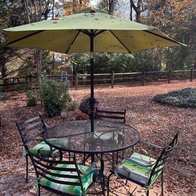 Patio Bistro table with four chairs, pads and table umbrella