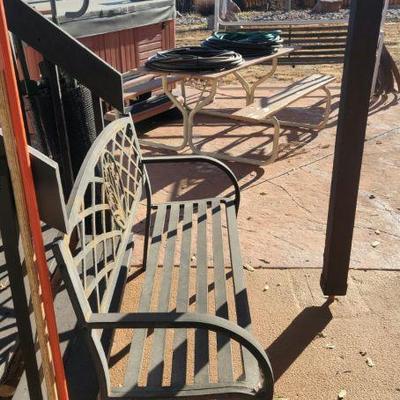 Yard Gliders, Picnic Tables, and Wrought Iron Bench