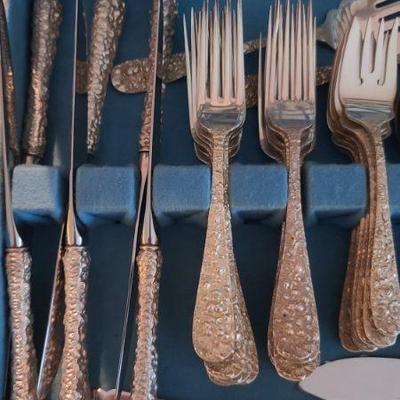 Kirk Stiff Repousse Sterling silver service for 18. A very large and beautiful set with server extras. 
