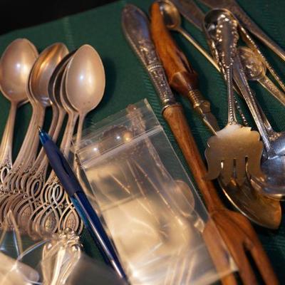 Sterling spoons and serving pieces. 