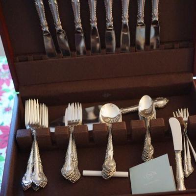We have two sets of sterling, with serving pieces