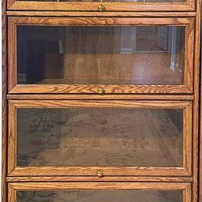 Lot 012   0 Bid(s)
Vintage Oak Barrister Cabinet with Four Glass Doors