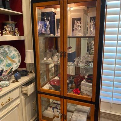 Asian style glass lighted curio cabinet