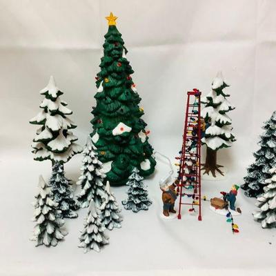 JOSW308 Department 56 Christmas Village Collection Accessories	Fun Christmas scene with lots of trees and people hanging lights.Â The...
