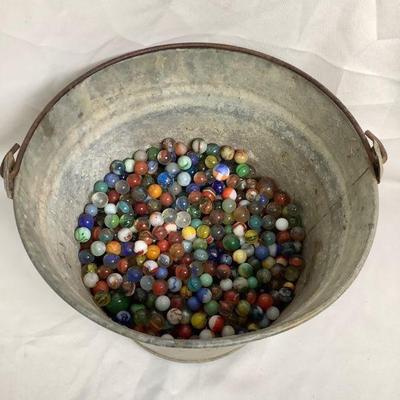 WIII211 Old Bucket Of Vintage/Antique Marbles	Come in galvanized steel pale. Marbles do almost come to the half way point inside. Lots of...