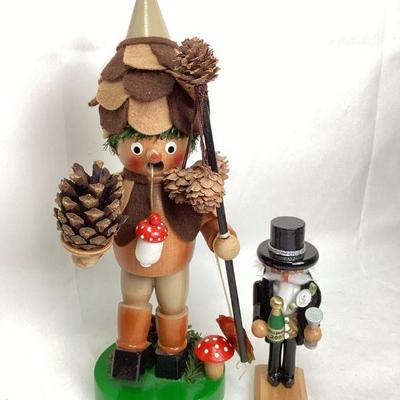 KIHE119 Signed Steinbach Nutcrackers	Two handmade, in Germany, holiday nutcrackers. The taller pine cone character is actually supposed...