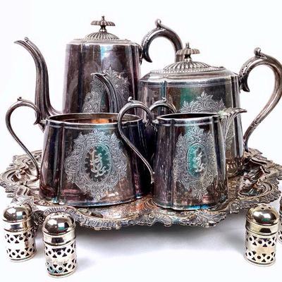 GRLE900 Vintage Silver Plated English Tea Service	Silver plated teapot, coffee pot, creamer, sugar, footed tray, and Â 2 sets salt and...