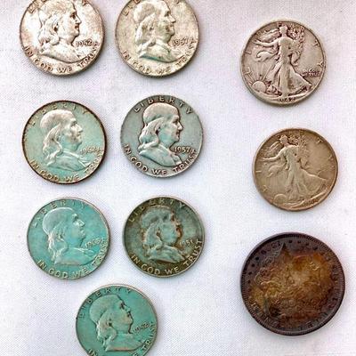 WIII906 Morgan Dollar & Franklin Half Dollars	1 1896 Morgan dollar. Â 2 Liberty half dollars, 7 Franklin 1/2 dollars.

