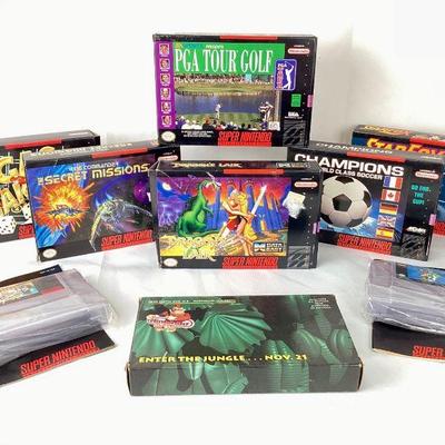 WIII912 Vintage Super Nintendo Games	8 Super Nintendo Entertainment System Games.Â 6 games in boxes still in their plastic wrap with...