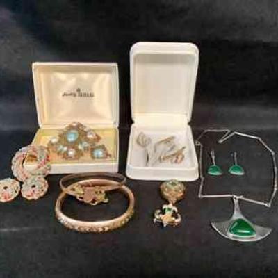 JUCR201 Variety Of Costume Jewelry, Corocraft, Sara Covington & More	Pin and earring set stamped Sarah Covington.

