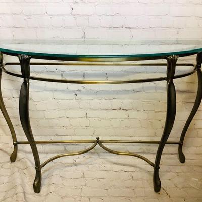 JOSW301 Brass And Glass Cocktail Table	Regency design with elegant legs and minimal ornate design features. Â There is some tarnishing on...