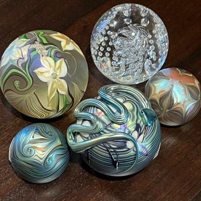 Just a few of many signed art glass paperweights