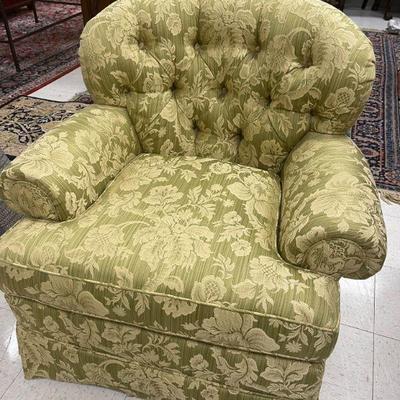 One of a pair of button back club chairs