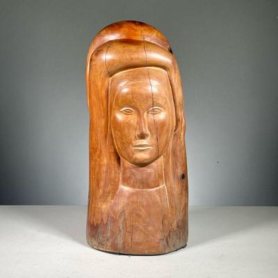 LINTON (20TH CENTURY) | Female figure with arms overhead. Carved wood. A modernist sculpture depicting female figure with her arms...