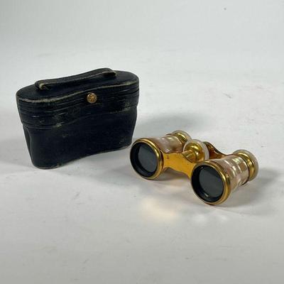 LEMAIRE OPERA GLASSES | Mother of Pearl and brass opera glasses in original case, marked Paris. - l. 4.25 in (case)
